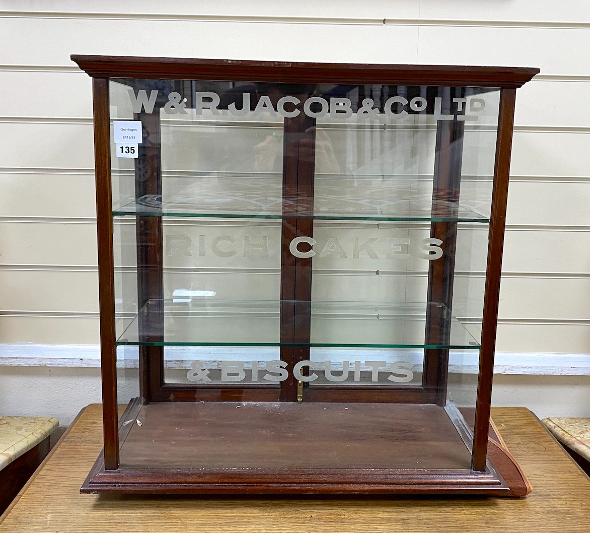 A late Victorian W & R. Jacobs & Co. Ltd. mahogany shop display cabinet, width 66cm, depth 34cm, height 66cm